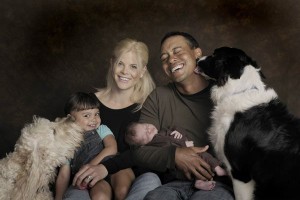 Tiger Woods with his wife Elin, children and two dogs - the picture perfect family - or is it?
