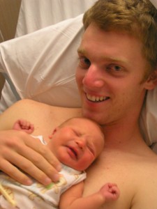 Mathew Hopkins and his newborn son, Alex